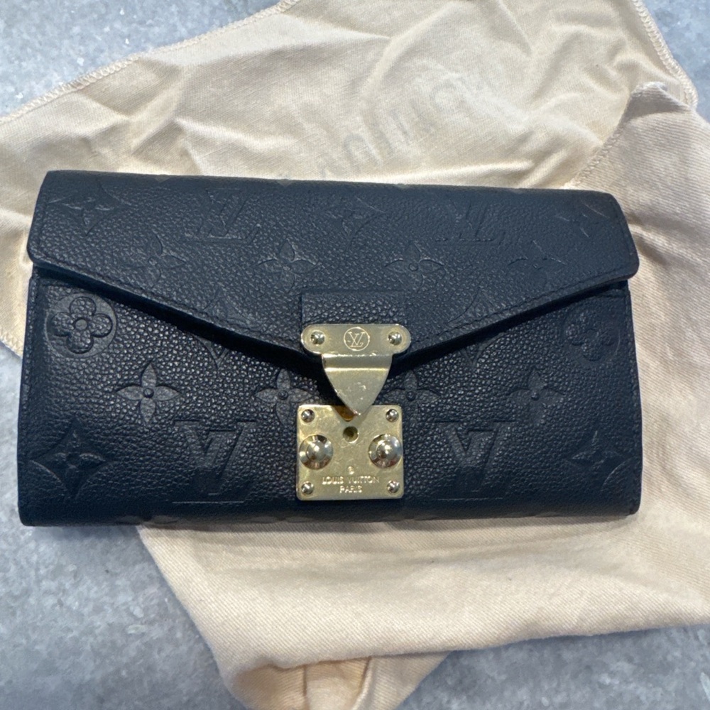 Louis Vuitton Black Leather Wallet with Gold Accents